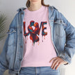 Woman in Love Unisex Heavy Cotton Tee enjoying a sunny day, reflecting positivity and style.